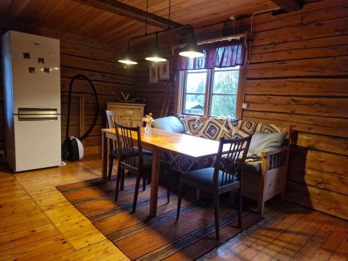 Log home in the woods in Skaulo