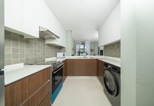 Seaside Modern 1BR Apartment at Blue Bay Walk, Pool & Beach in Umm Al Quwain