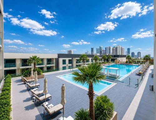 Seaside Modern 1BR Apartment at Blue Bay Walk, Pool & Beach in Umm Al Quwain