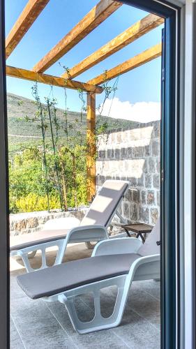 Surrounding environment, Lustica Stone Villa by V&J - Historic House with Exclusive Beachfront Sunbeds in Mirista