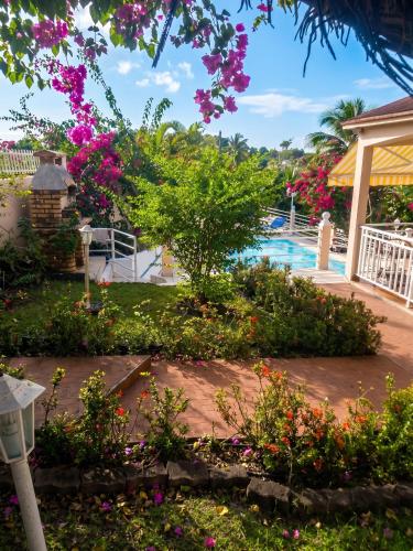 tuin, Appartement lumineux avec piscine partagée, Sainte-Anne, 75 m² (Appartement lumineux avec piscine partagee, Sainte-Anne, 75 m²) in Le Moule