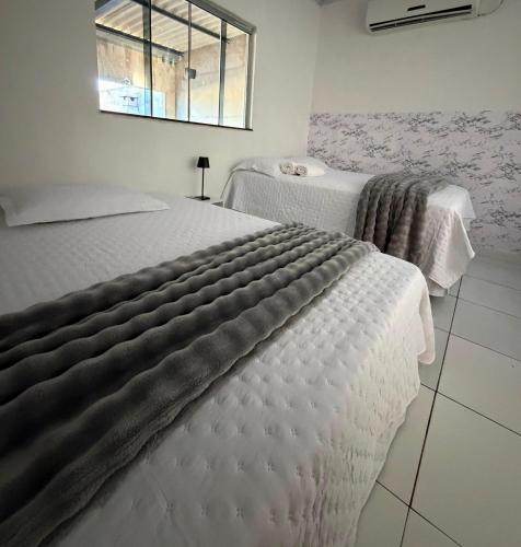 Casa com dois quartos e piscina em mineiros in Mineiros