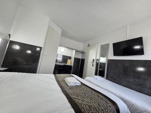Chambre triple, 3 lits