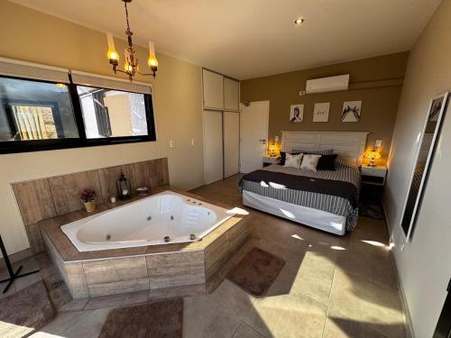 Vasca idromassaggio, Villamagna, cabaña con jacuzzi en Potrerillos (Villamagna, cabana con jacuzzi en Potrerillos) in Valle Del Sol (Potrerillos)