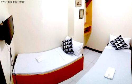 Heart Hotel and Services Room Type - Economy Twin
