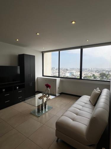 Suite moderna con vista espectacular a la ciudad