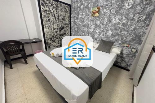 Evans Realty - Hostal