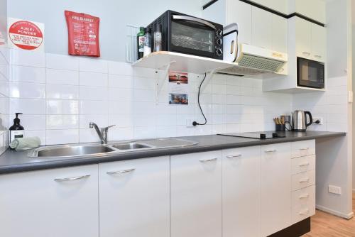 Kitchen, Condo 105 @ Horizons Golf Resort - Salamander Bay NSW in Salamander Bay