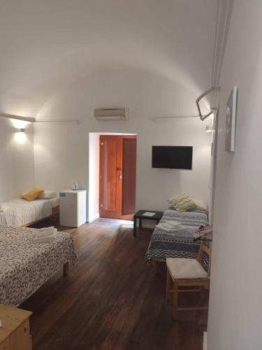 Munaciello Rooms Room Type - Quadruple Room with Balcony Munaciello Rooms Room Type - Quadruple Room with Balcony