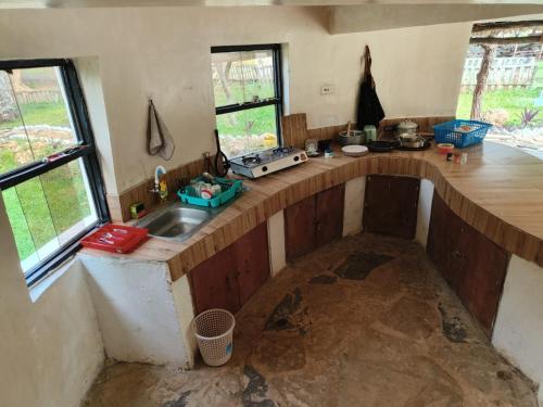 Tiny house, kitchen downstairs in Shimoni