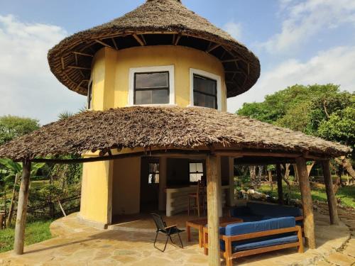 Tiny house, kitchen downstairs in Shimoni
