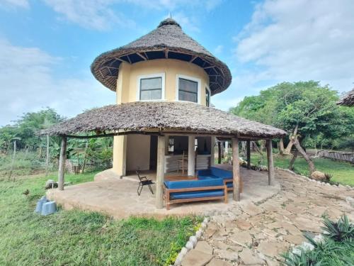 Tiny house, kitchen downstairs in Shimoni