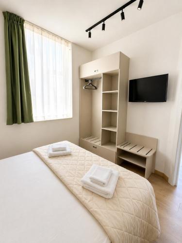 1 queen bed, 1 bunk bed, 1 sofa bed
