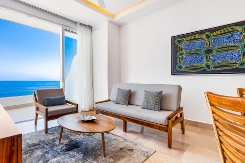 Ocean-view 1BR/2BA in Puerto Vallarta with pool, gym & balcony.