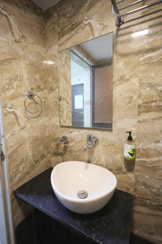 Banyo, hotel green ac&non ac rooms in Vapi