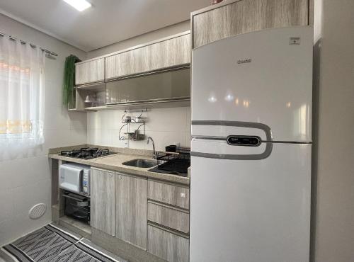 Jardim Acácias - Apartamento com 2 Dormitórios sendo 1 suíte a apenas 6 minutos da Praia de Palmas - image 4
