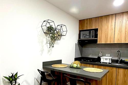 Modern 2BR Apartment with Rooftop Coworking and Gym