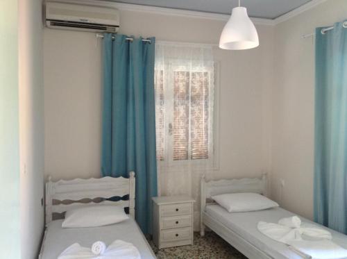 Two-Bedroom Apartment (4 adults) with Balcony room in Villa Chrisanthi