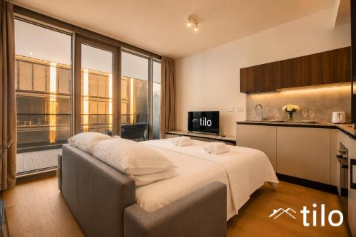 Waterfront · 1BR · Terrace · Parking · Tilo Genoa
