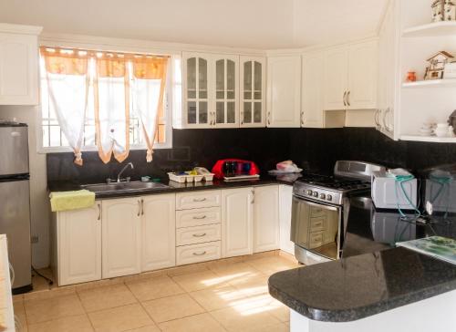 Kitchen, Elegant Villa in Nagua with Private Pool and Jacuzzi in Nagua