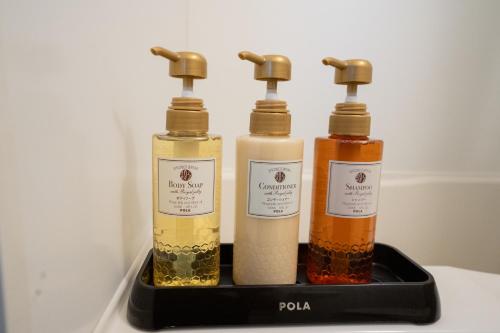 Badezimmer, Hotel Sunset ZANPA ホテルサンセット残波 in Yomitan