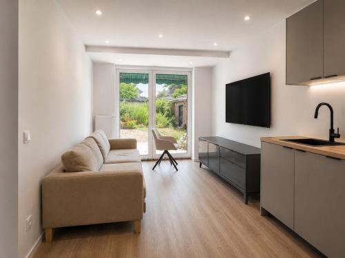 Modernes Apartment - Bis 5 Personen - Terasse & Küche & WLAN - W1 (Modernes Apartment - Bis 5 Personen - Terasse & Kuche & WLAN - W1) in Dormagen