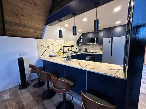 Alpine River Cabin with direct access to the river in Pinalito