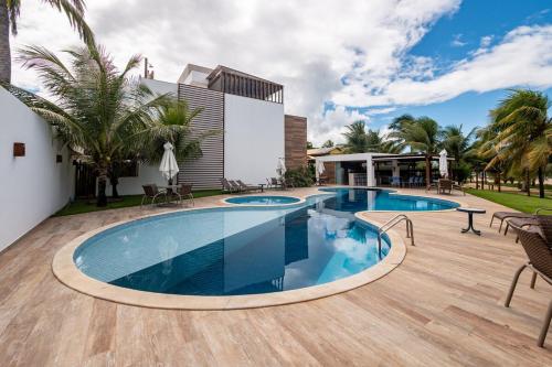 Swimming pool, Vilage Pe-na-Areia, condominio, Itacimirim in Itacimirim