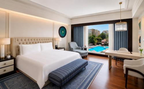 Waldorf Astoria Cairo Heliopolis by Hilton Room Type - Premier King Room with Pool View