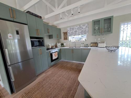 Kitchen, Care Cottage Coastal Nature Stay in Canelands