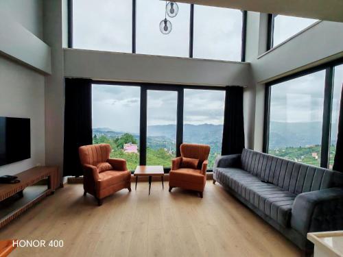Koplietošanas atpūtas telpa ar TV, Kalmuk Nature Resort & Villas in Akoluk