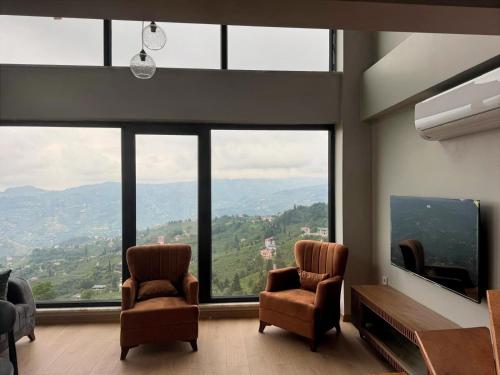 Koplietošanas atpūtas telpa ar TV, Kalmuk Nature Resort & Villas in Akoluk