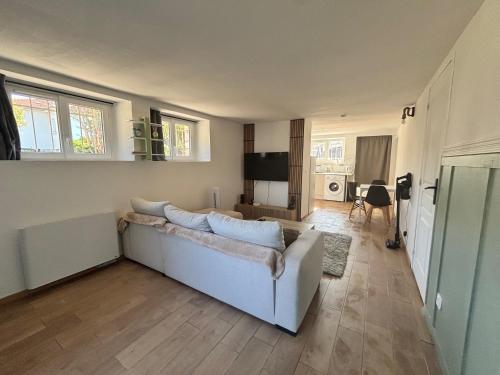 Appartement cosy avec jardin et terrasse au calme