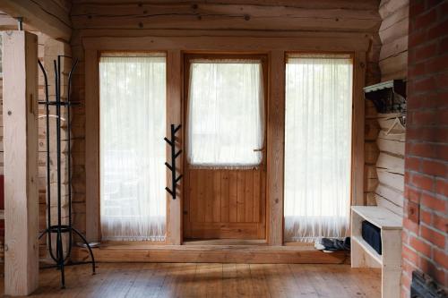 Koplietošanas atpūtas telpa ar TV, Quiet Log House Getaway in Nature in Tartumaa