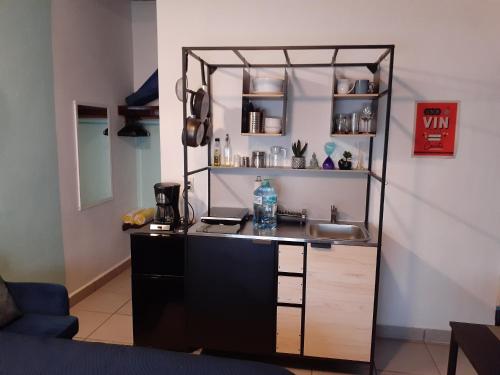 virtuve, "Le Petit Oasis" Pool, AC and Beach 1 minute away in Penita de Jaltemba