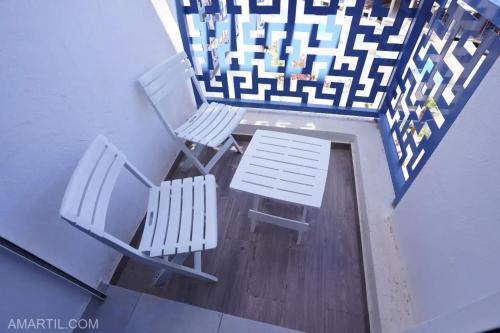 Charming 1-Bedroom Apartment in Martil with pool - image 5