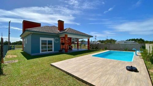 Casa de Praia com Piscina e Churrasqueira a 900m da Praia in Arroio do Sal