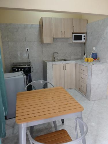 Elite Serviços- Casa T2 (Elite Servicos- Casa T2) in Matola Río