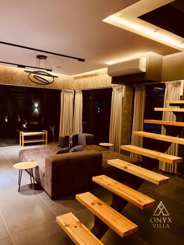 Sala de estar/TV partilhada, Onyx Villa in Al Jizah