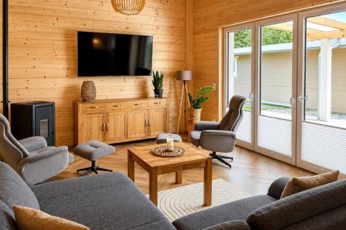 Jagatud salong / TV-ala, Neubau am See exklusive Ausstattung und Terrasse in Surwold