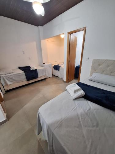 Suites Pitangueiras - POUSADA FRENTE MAR in Guaruja