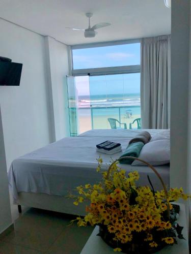 Suites Pitangueiras - POUSADA FRENTE MAR in Guaruja