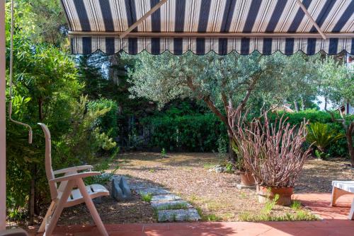Appartamento Lacona Con Giardino - image 5