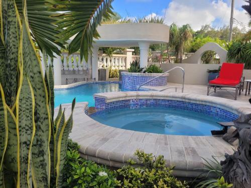 Piscina, 12 Palms Villa in Shermans