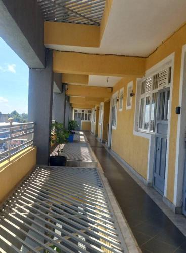 Bella apartments in เมรู