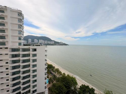 Rainbow Paradise Seaview by Achlys Collection near small potato Cafe