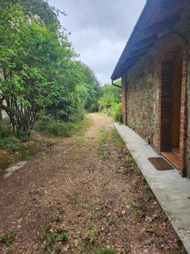 Viesnīcas āriene, Cottage in the woods, charm and relax in Carrosio