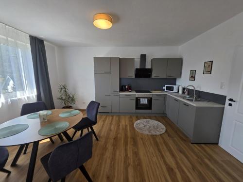 Konyha, Modernes Apartment zwischen Seen & Bergen in Eberstein