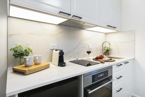 Kitchen, Stylish Studio with Rooftop Harbour Views in Darling Point