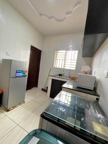 Kitchen, Elected Apartments in Olowora